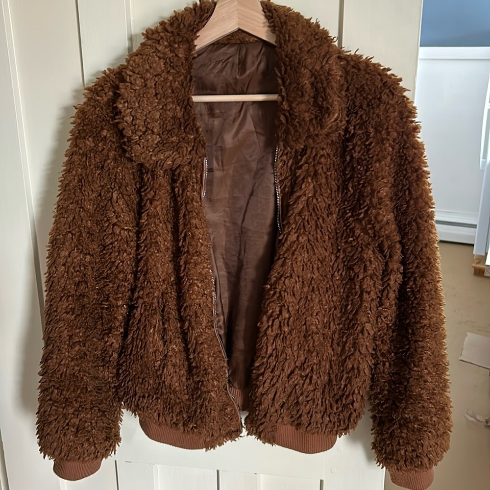 Teddy style fluffy bomber jacket with pockets. Used.